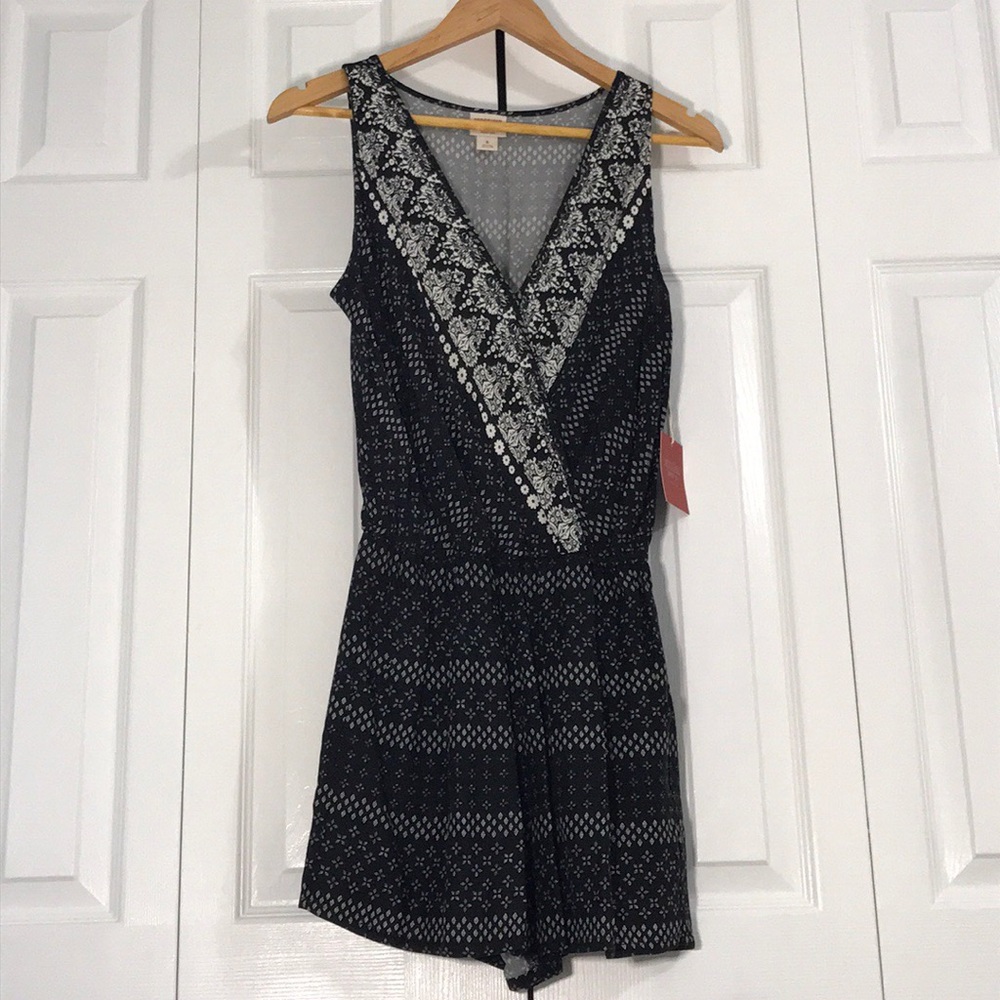 SOLD- Black & White Sexy Low V Cut Romper